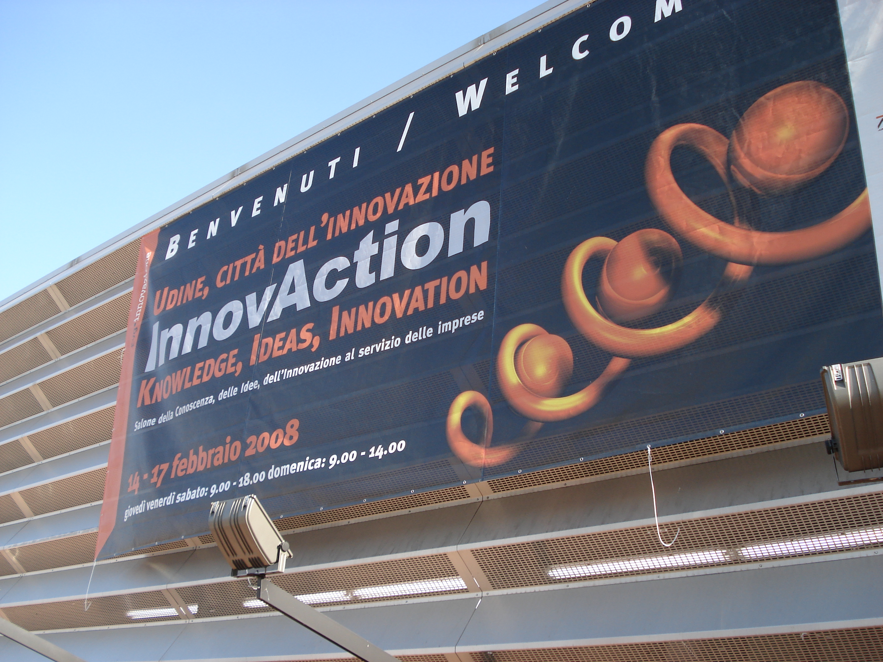 Banner outside the Innovaction fair in Udine, Italy